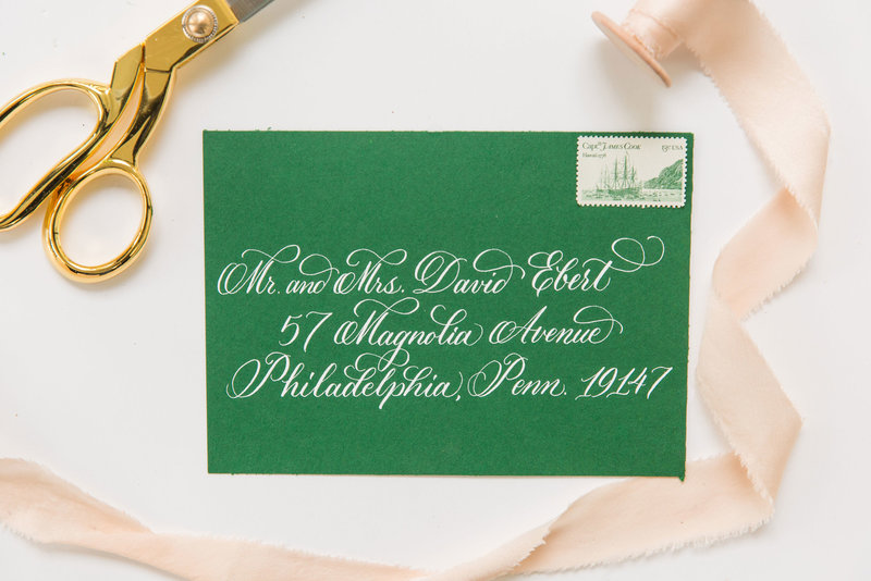 Green envelope with pointed pen calligraphy