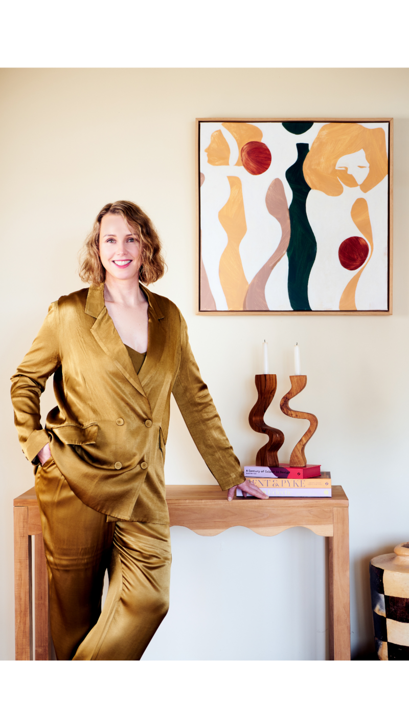 Interior designer standing in front of styled hall table