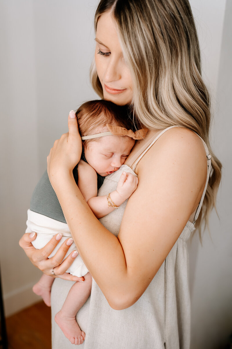 woman holding new baby