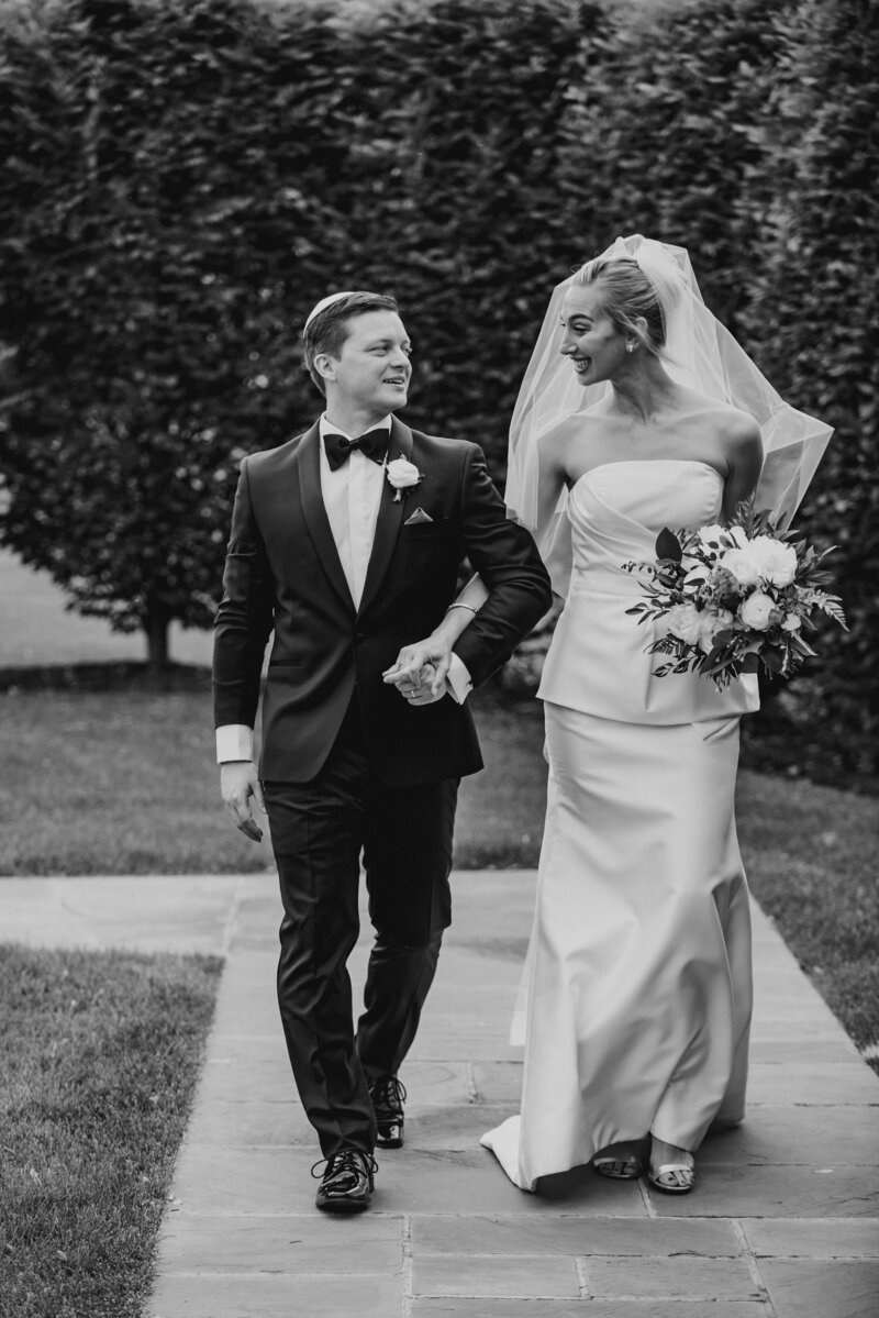 BRIDE AND GROOM WALK DOWN AISLE AT ROUNDHOUSE BEACON IN NEW YORK