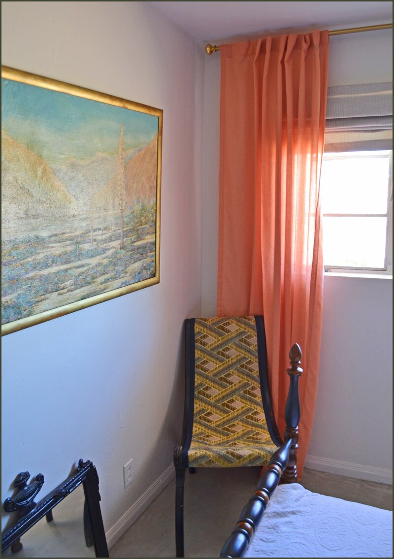Mid-century modern bedroom with orange curtains