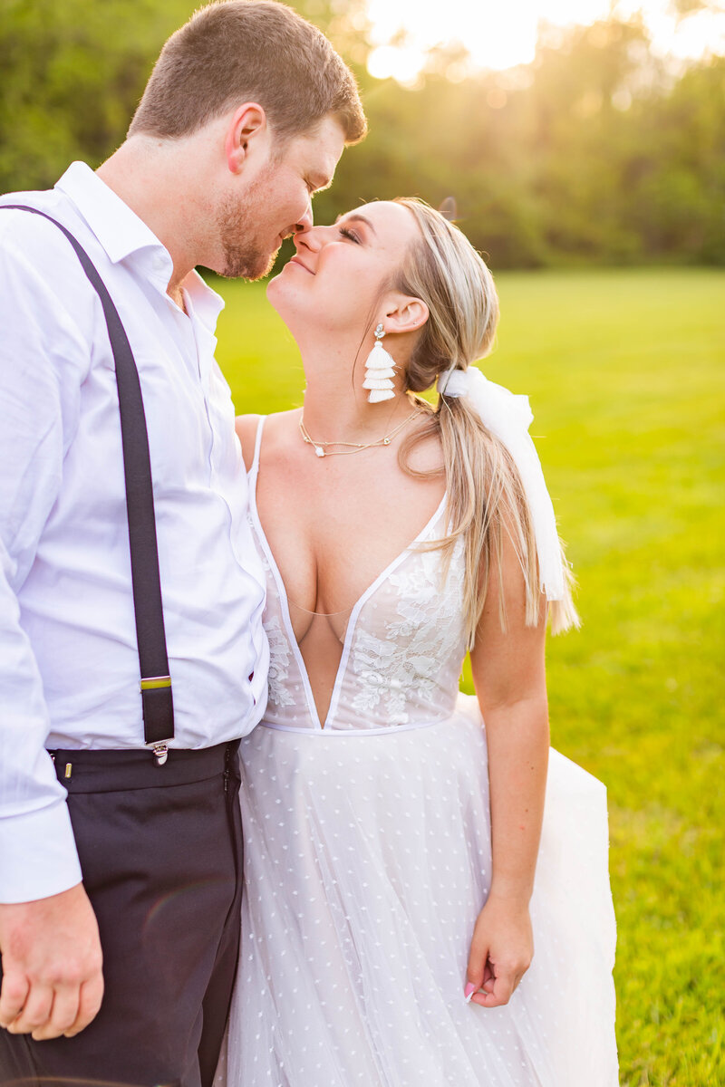 Couple shares embrace on wedding day in Charleston, South Carolina.