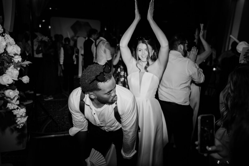 A bride and groom dancing at their wedding reception in a black and white photo at the Ben, Autograph Collection in West Palm Beach.