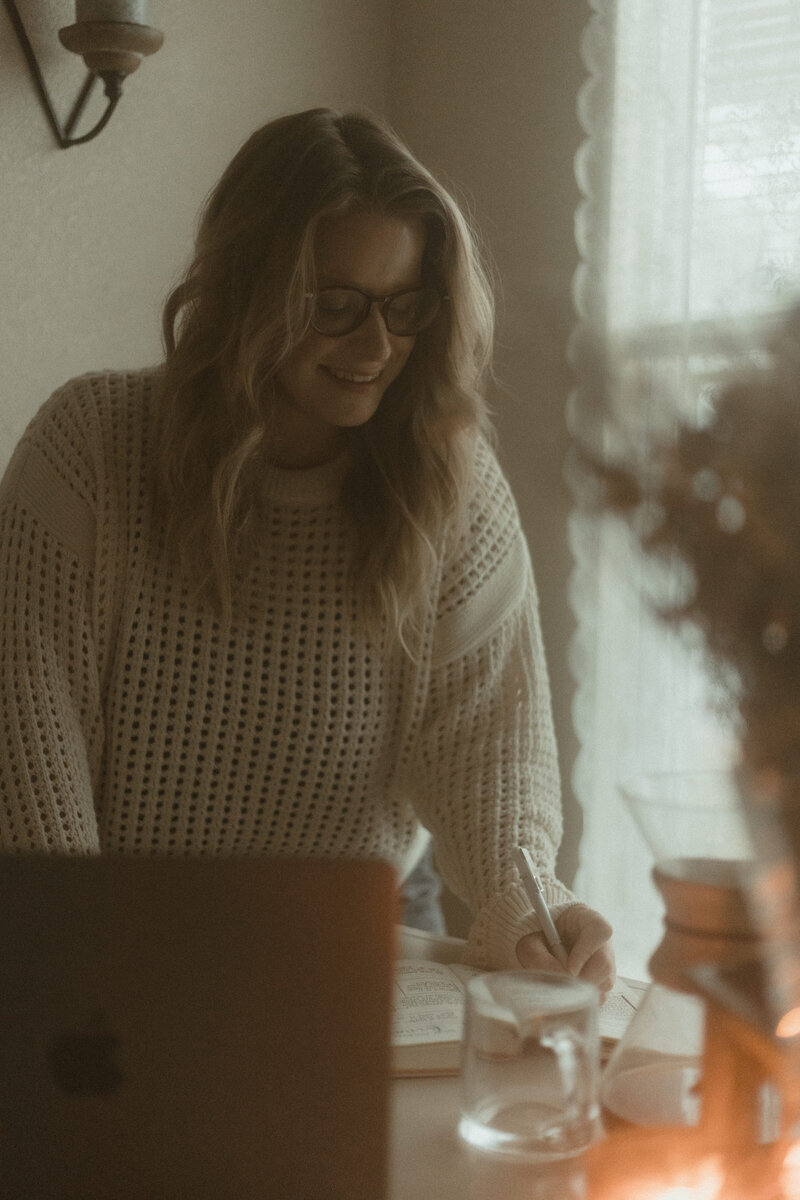 Brittany Fitch, founder of Larks Atelier strategizing with a client on creating a high-converting web design.