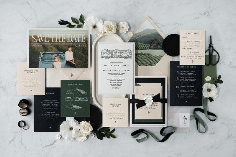 Custom designed wedding stationery with white paper and modern serif text