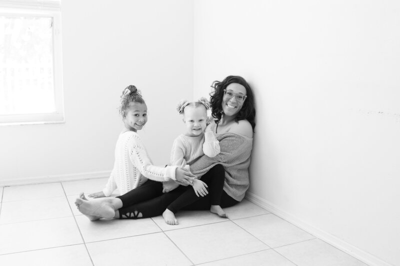 Photographer posing with her kids Franklin tennessee photography studio