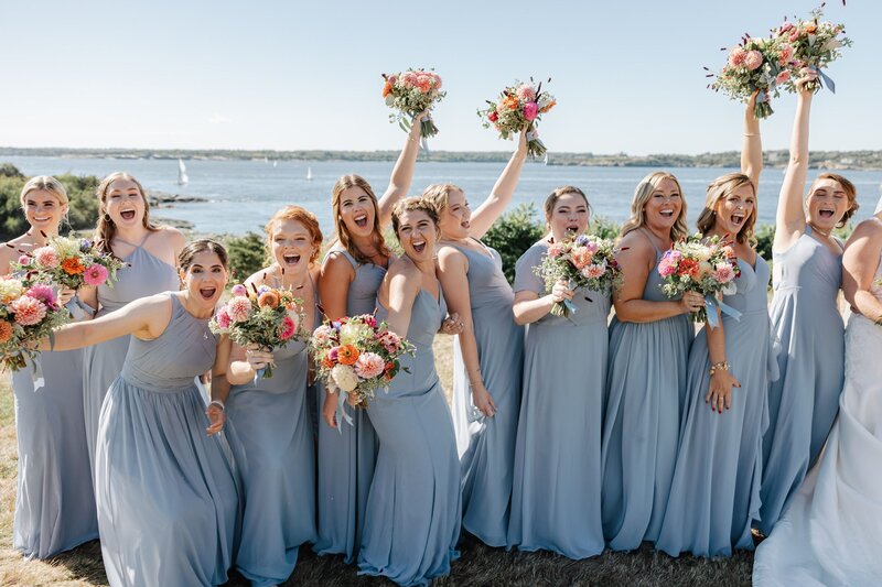 Bridesmaids in light blue dresses