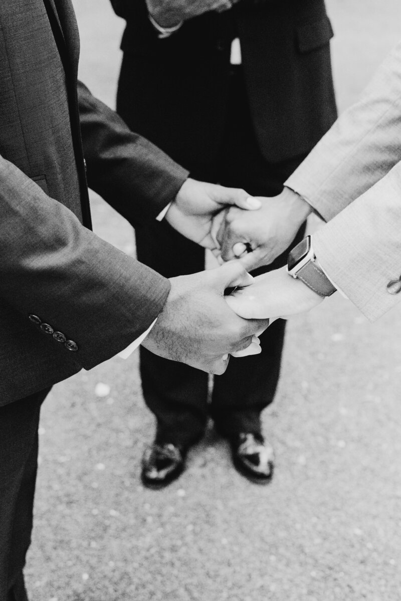 LGBTQ elopement holding hands