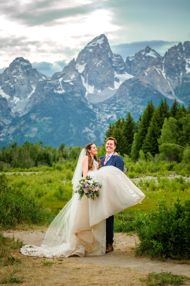 Jackson Hole videographer captures groom lifting bride after Jackson Hole elopement