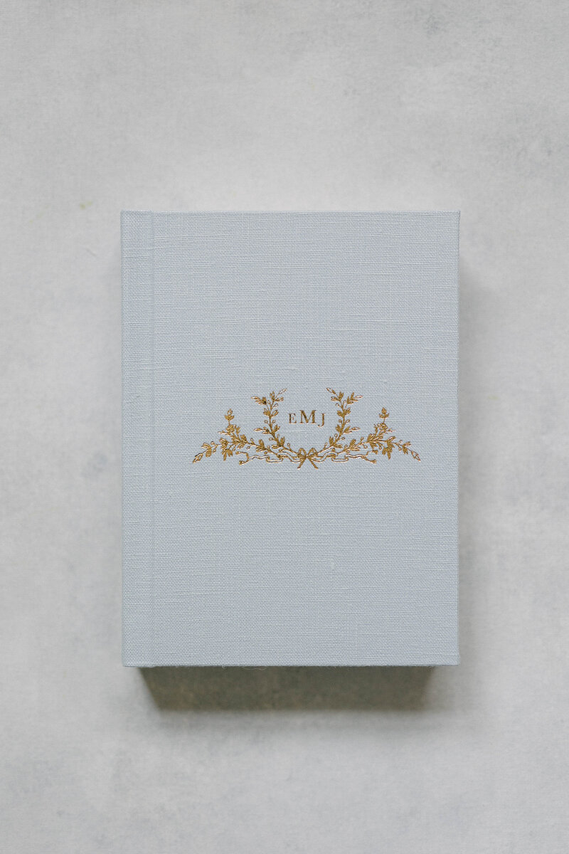 fine art blue linen heirloom album knoxville tennessee newborn photographer