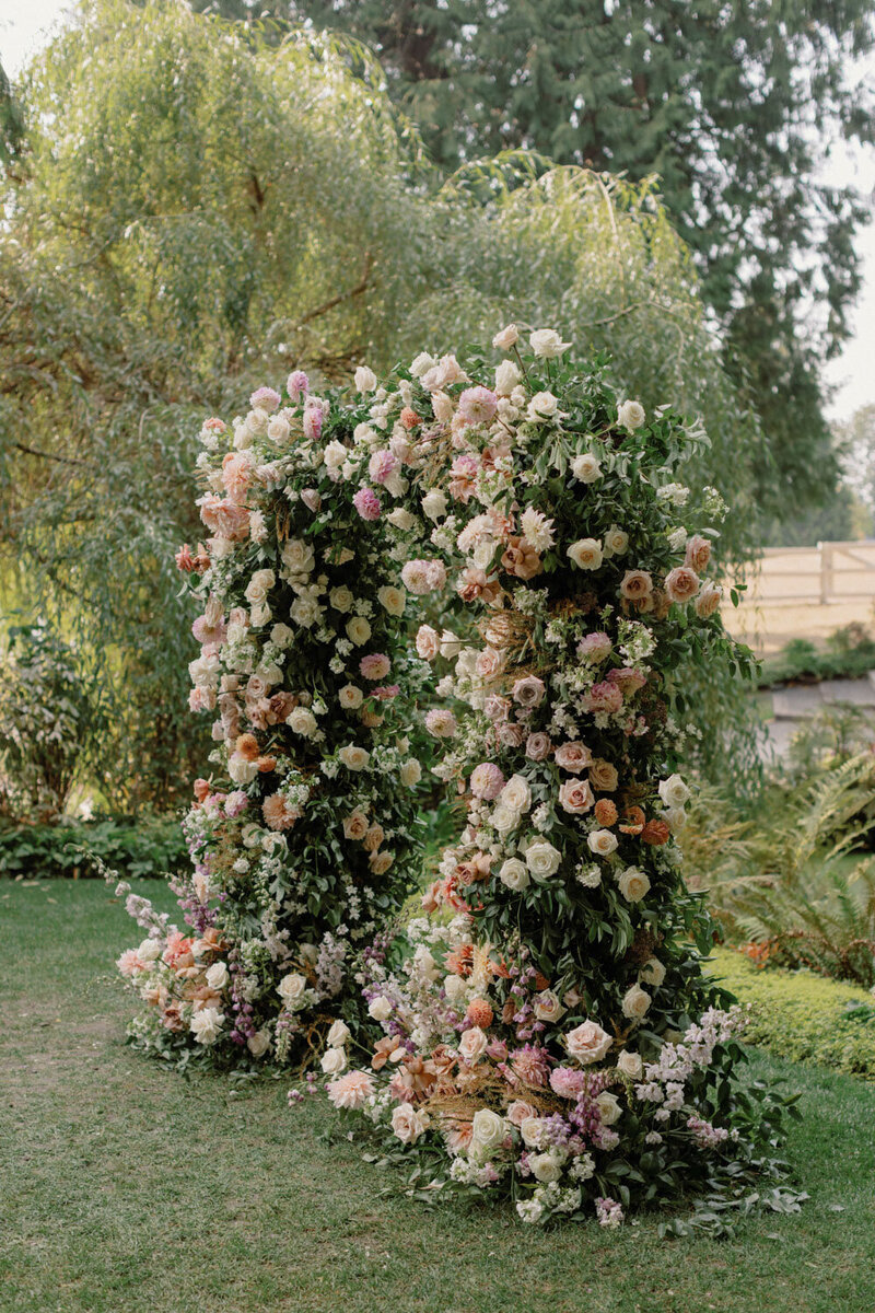 Luxurious floral arch set up for a wedding ceremony