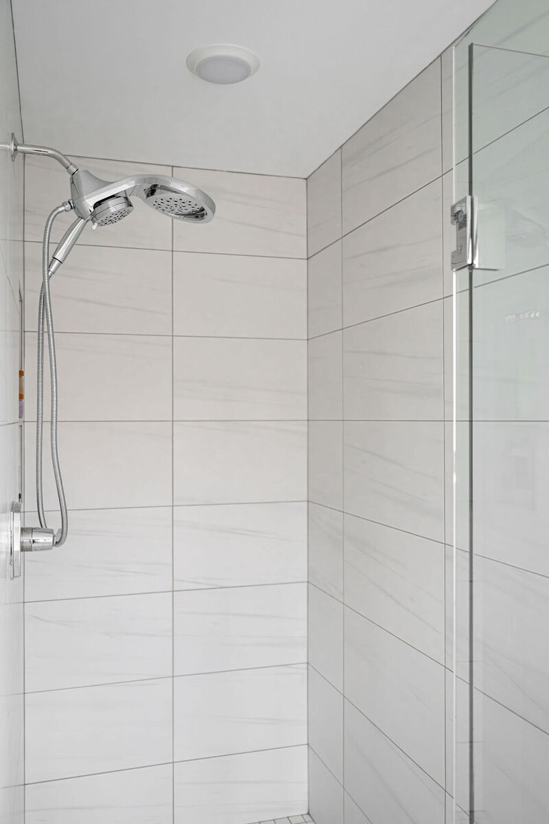 minimalist-white-tile-shower