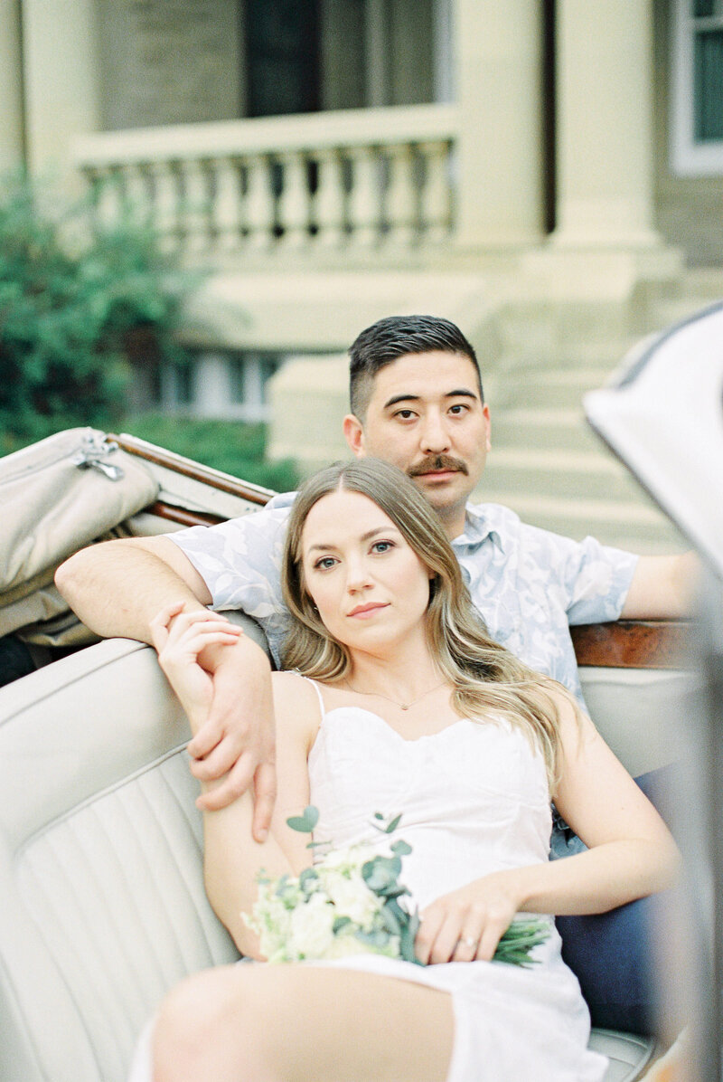 Couple laying in a car