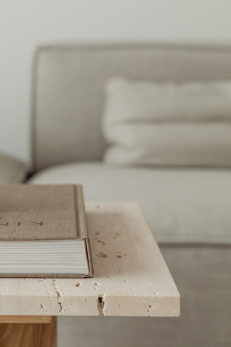 kaboompics_The book lies on a travertine table