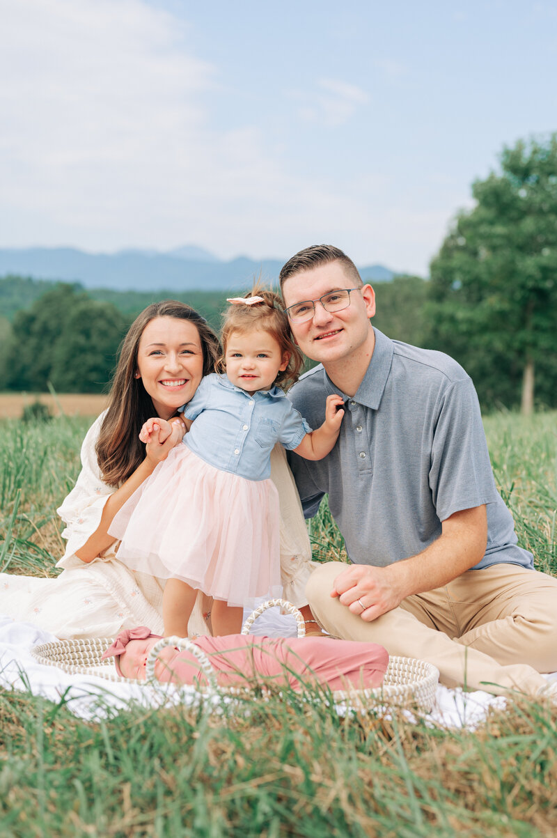 family photo session at the Biltmore Estate with toddler and newborn baby girl and Asheville Newborn Photographer