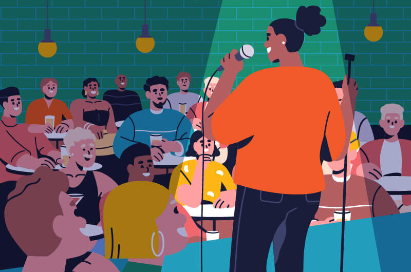 Illustration of a comedian on stage in front of an audience of people