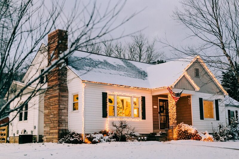 White house decorated in white Christmas lights with tree in the window by Winx Photo, Knoxville Wedding and Boudoir Photographer