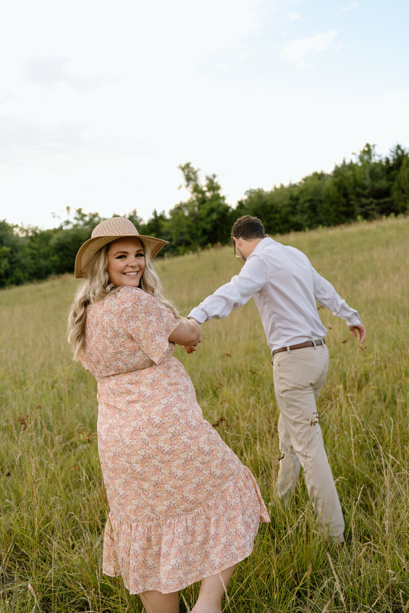 Summer engagement session photoshoot at Loose Park in Kansas City photographed by Emma Leigh Photo.