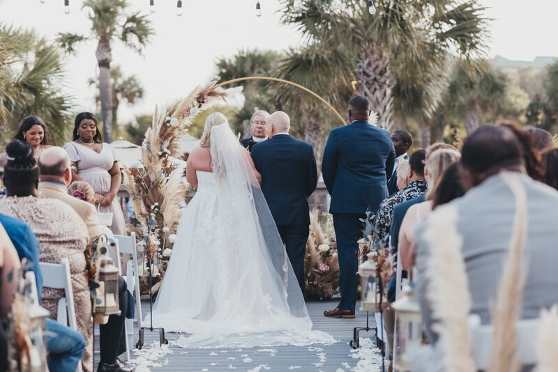 father handing over his daughter at hilton head wedding
