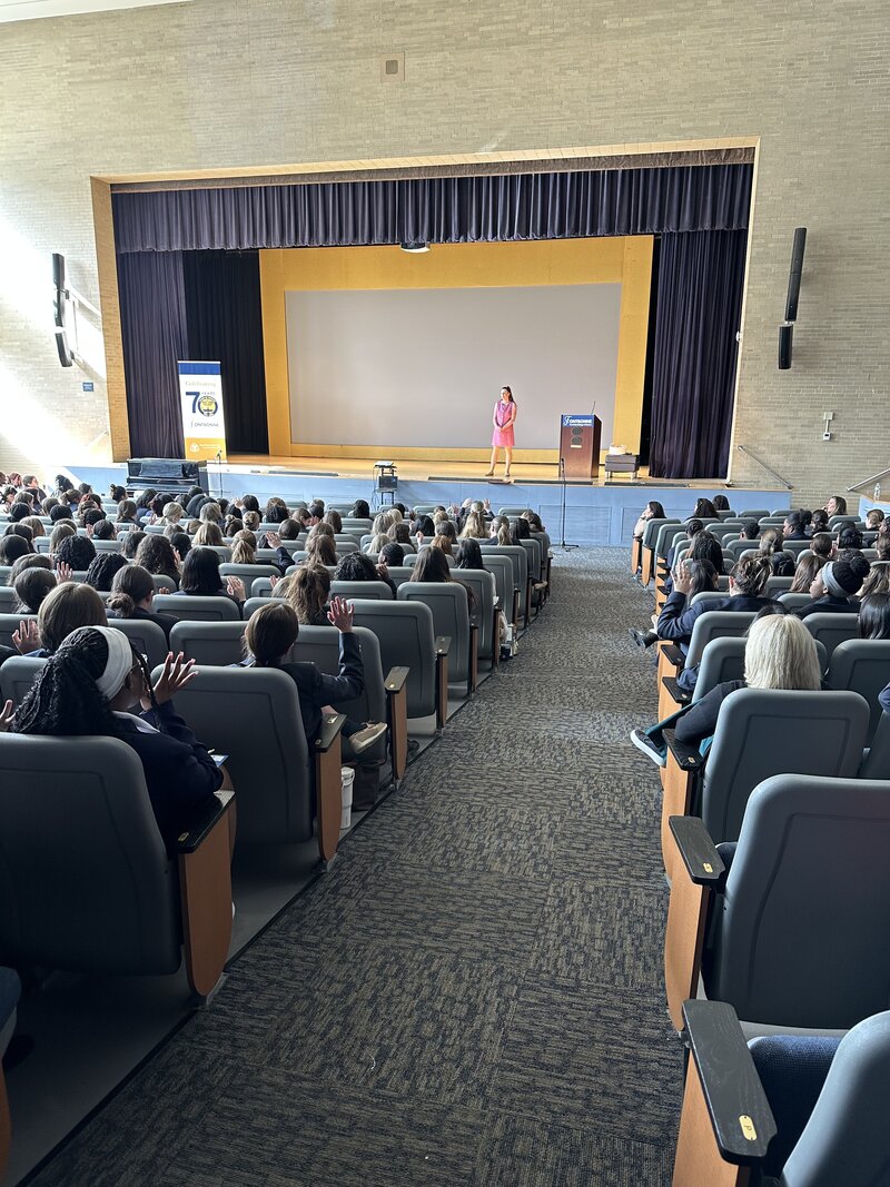 woman speaking at conference