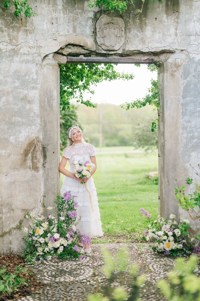 A bride at Gwyn Careg Inn smiling into the distance. 