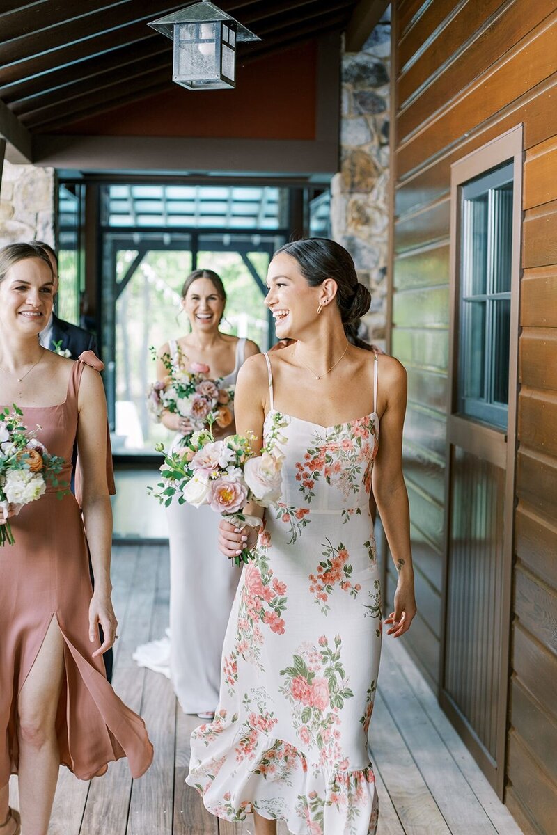Mix matched patterned floral bridesmaid dresses with organic white tan and blush bouquets