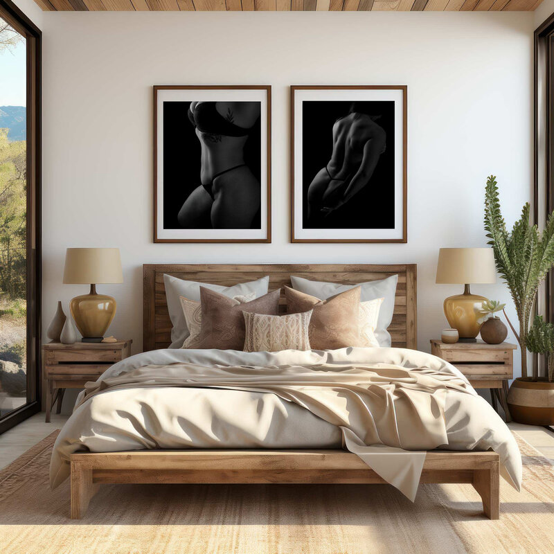 A woman's super sexy silhouette's are displayed above her bed in her bedroom.