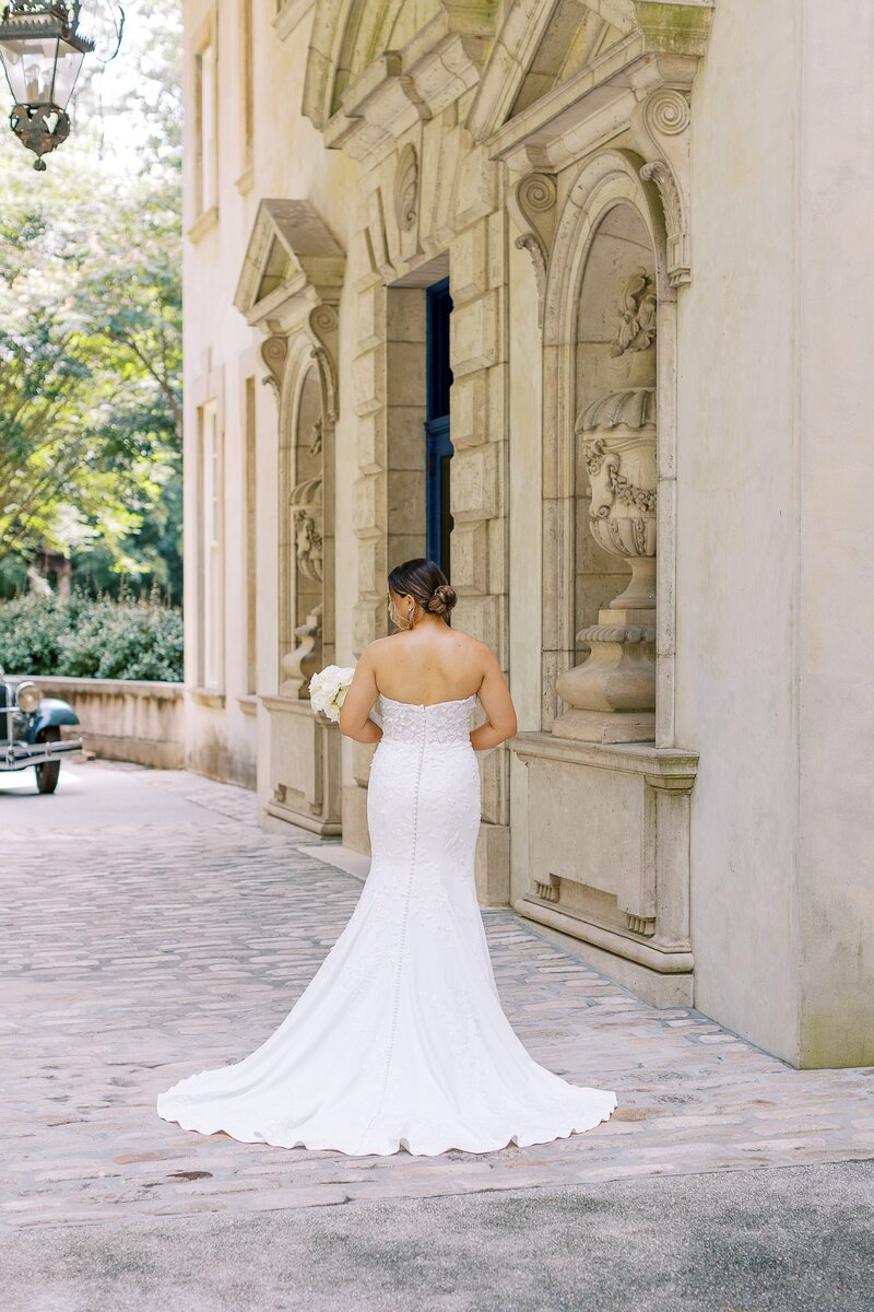 Bride stands outside of Atlanta History Center in Georgia