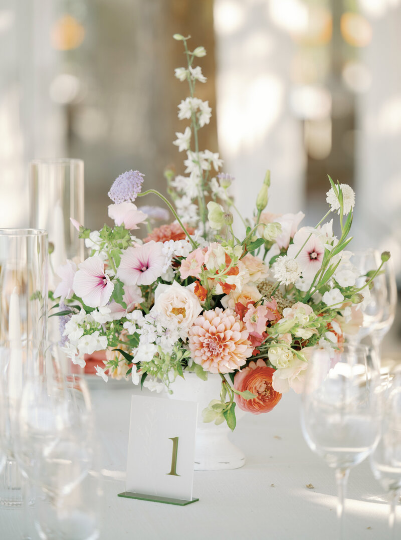 Luxurious pastel flowers sit on a table at a wedding in Northern California.