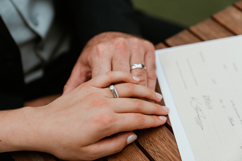 destination elopement photography in isle of skye, hands reaching, bride and groom eloping