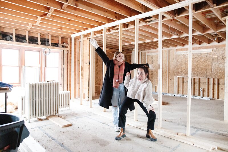 two women in house under construction