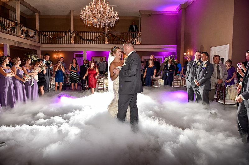 couple is dancing in a sea of clouds