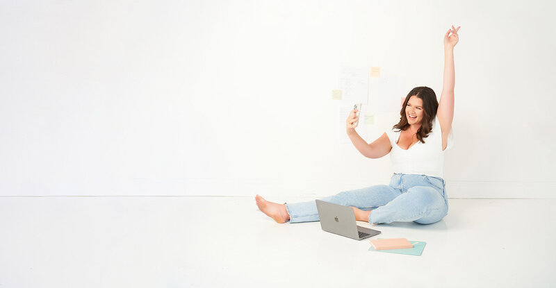 travel agent standing in front of her moodboard