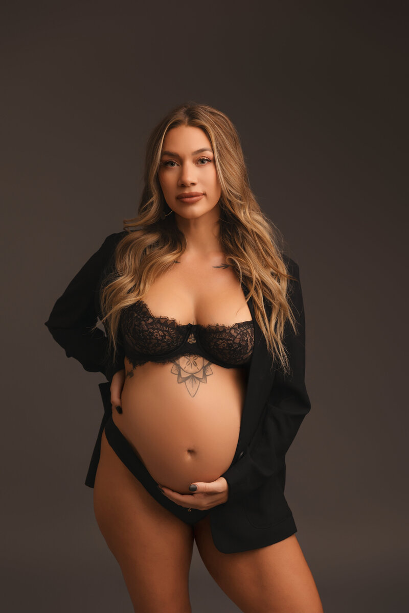 editorial maternity portraits with bra and underwear in jacket in phoenix maternity studio