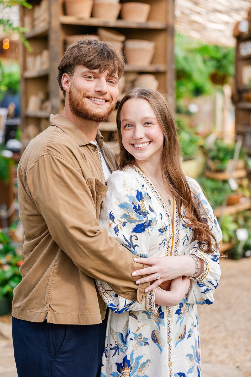 Newly engaged couple posing in Botanic Greenhouse | Opelika AL Proposal Photographer Amanda Horne