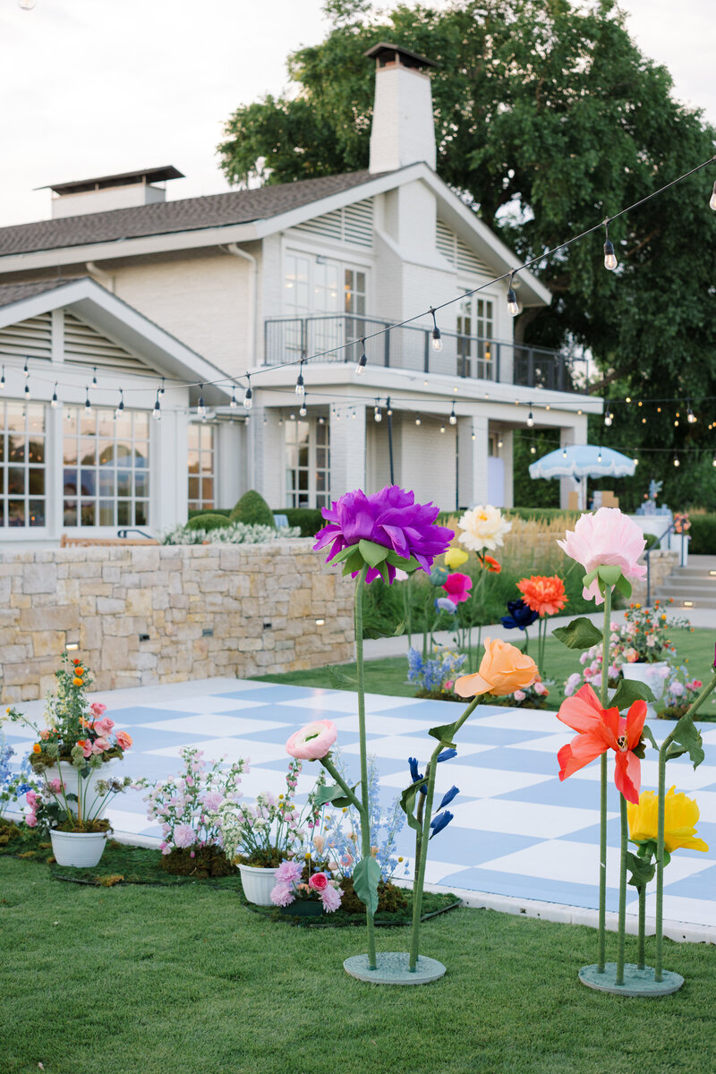 colorful blue and white checkered dance floor for wedding reception outside Mission Hills Country Club