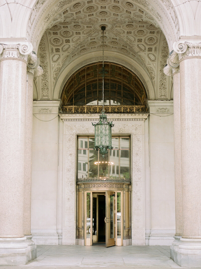 stunning Detroit architecture, Cadillac place, ornate details, gilded door, Detroit film wedding photographer