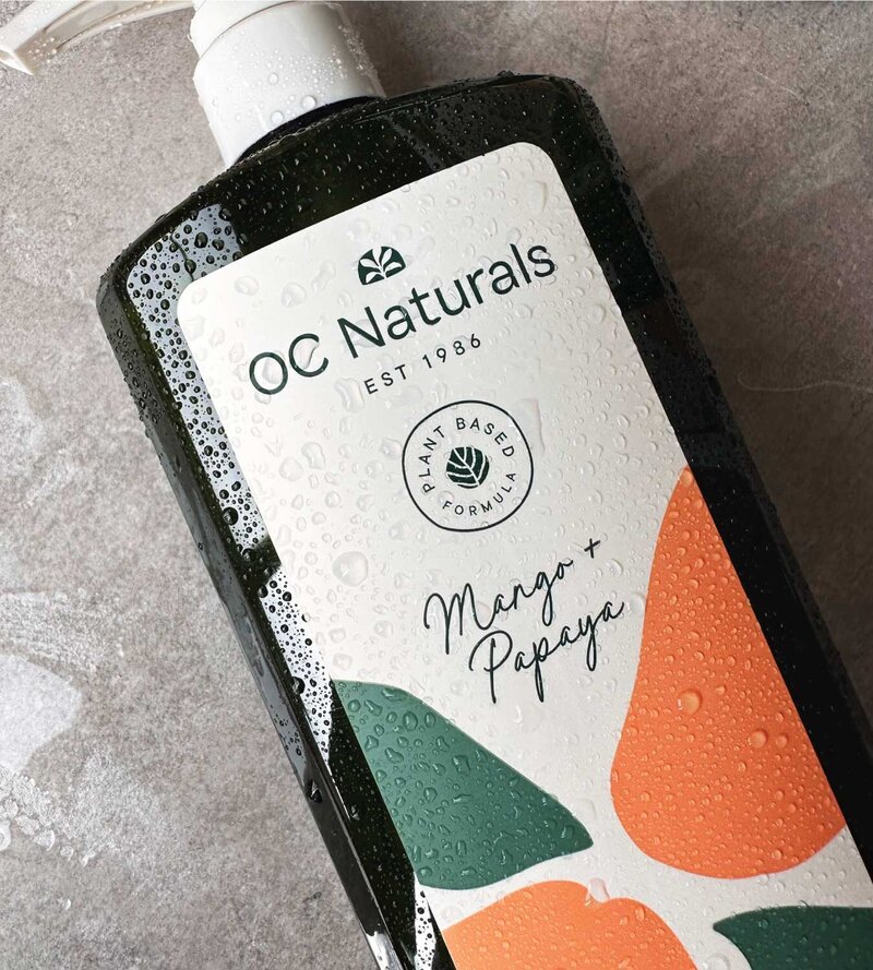 Close up of packaging design label for OC Naturals body wash mango and papaya