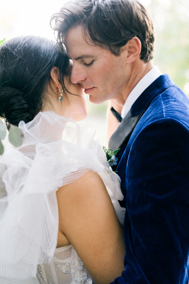 Raleigh wedding couple embracing