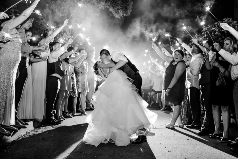 Black and white photo of Grand exit with sparklers