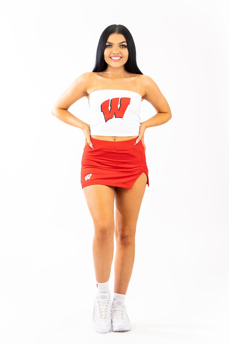 red skort with college logo in the corner