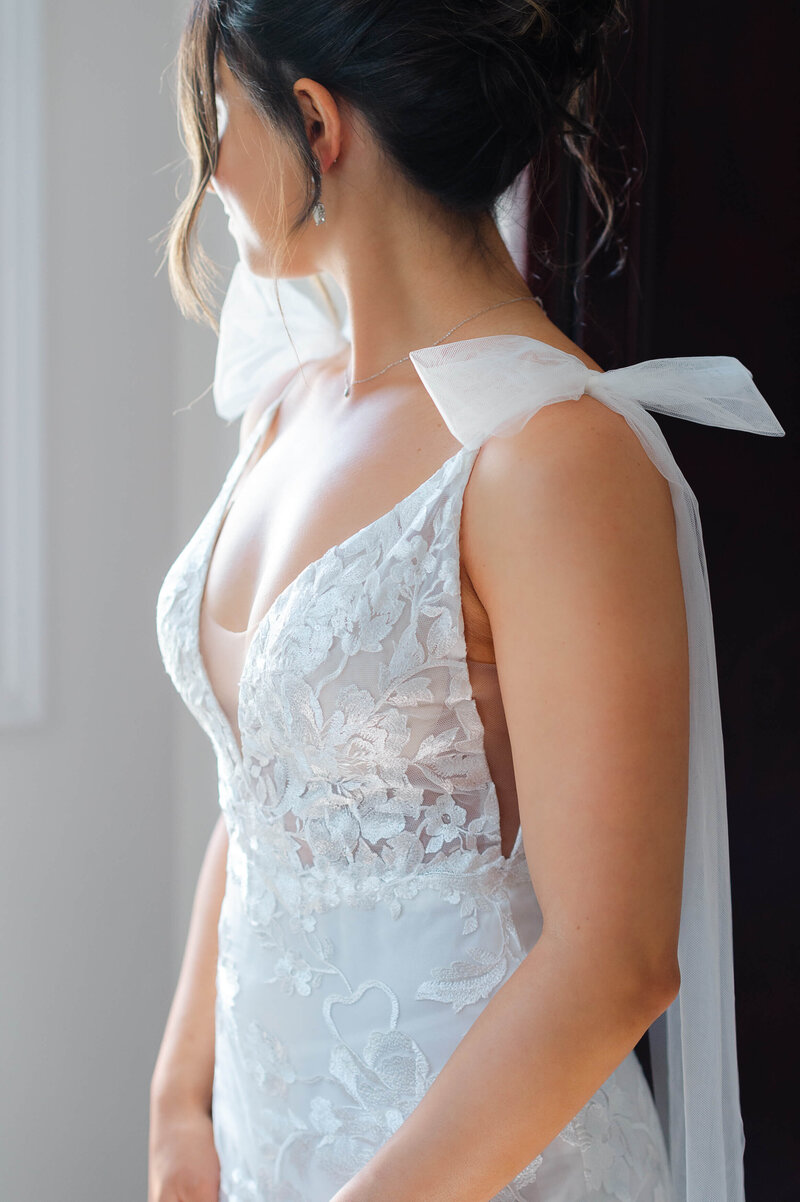 Ottawa wedding photos showing the details of a bride's dress and veil.  Captured by JEMMAN Photography