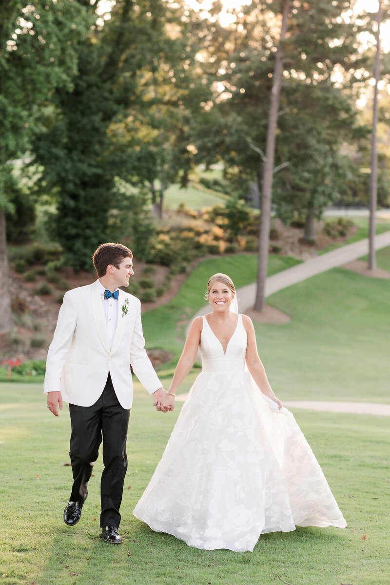 married couple at mary's cottage in falls park in downtown greenville sc