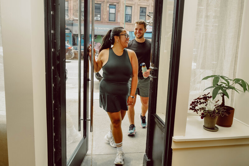 Clients walking in the Pilates studio door for open gym time