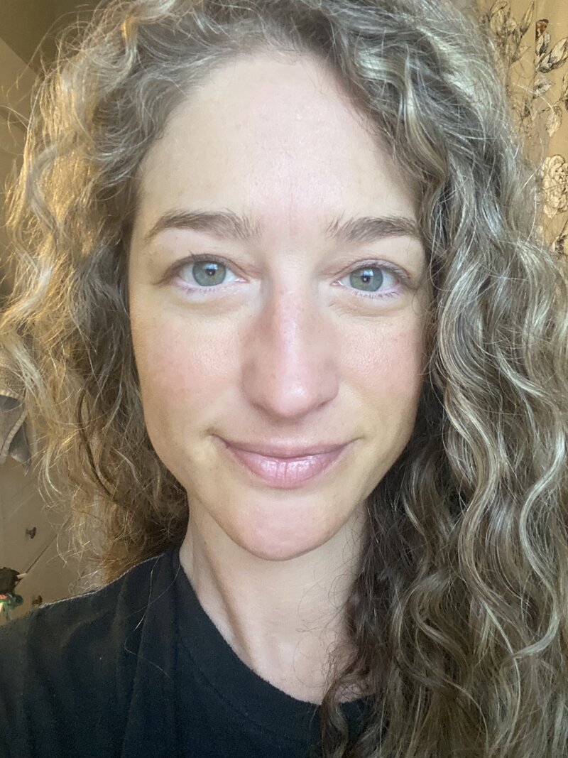 woman smiling after healing melasma