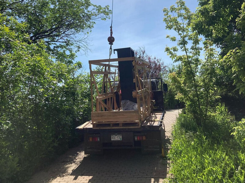 Residential and commercial chimney and roof installation by Mountainside Crane Service for Denver Metro and Foothills