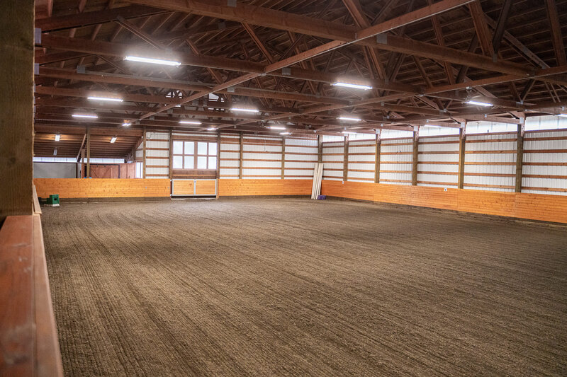 wide angle photograph of a professional equestrian facility