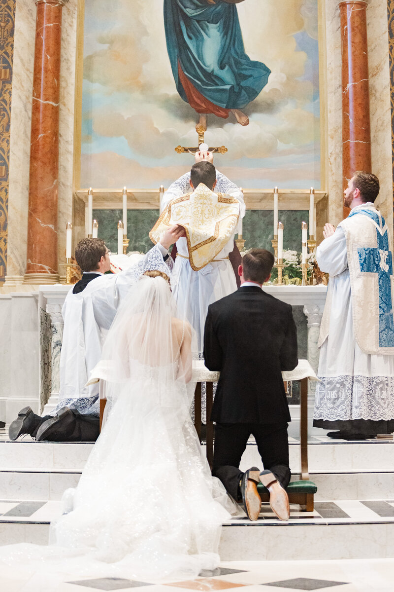 Eucharist raised at a Catholic Wedding