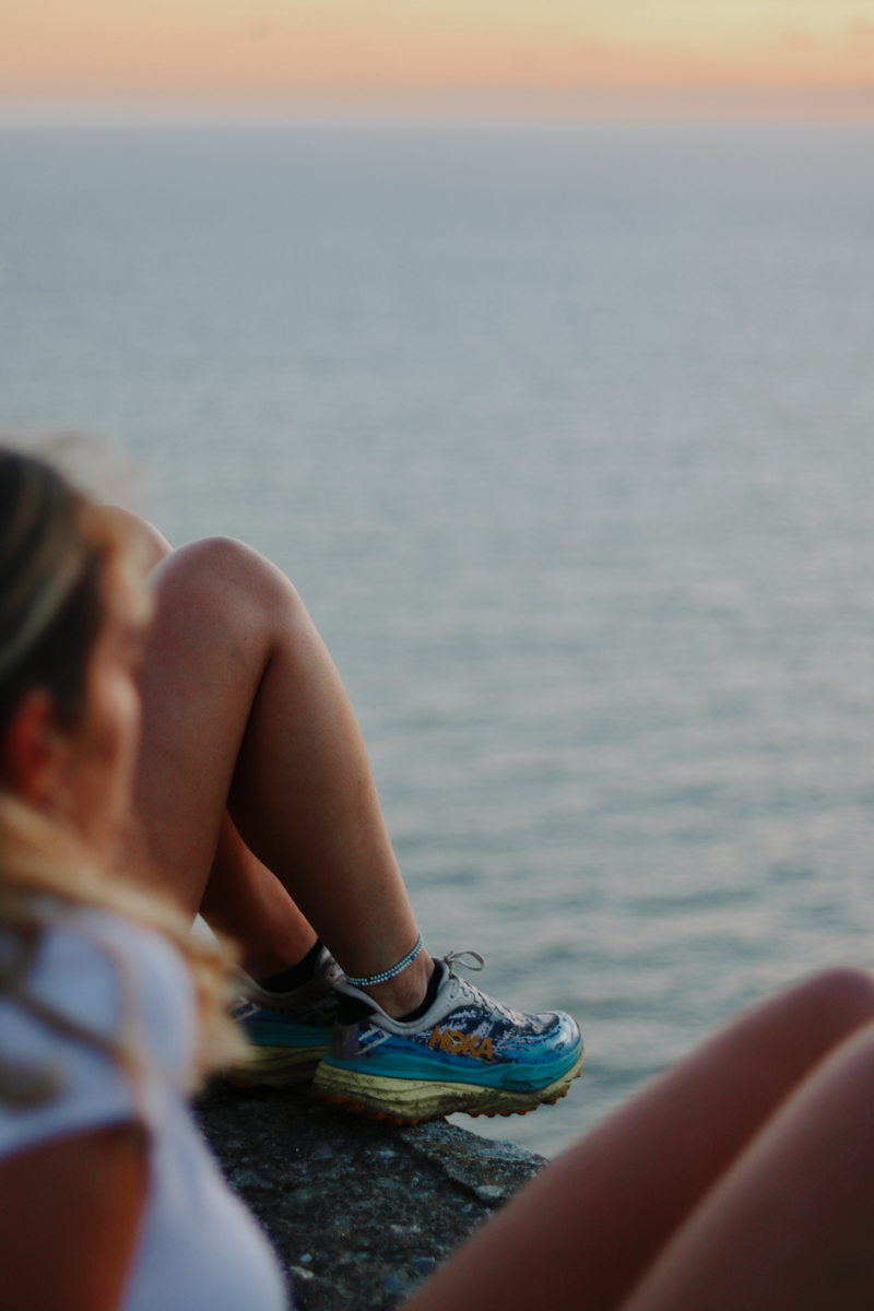 Having a brief rest after a run at Rame Head.