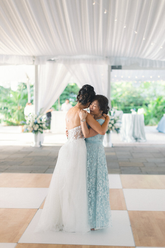 bride and mom first dance during reception